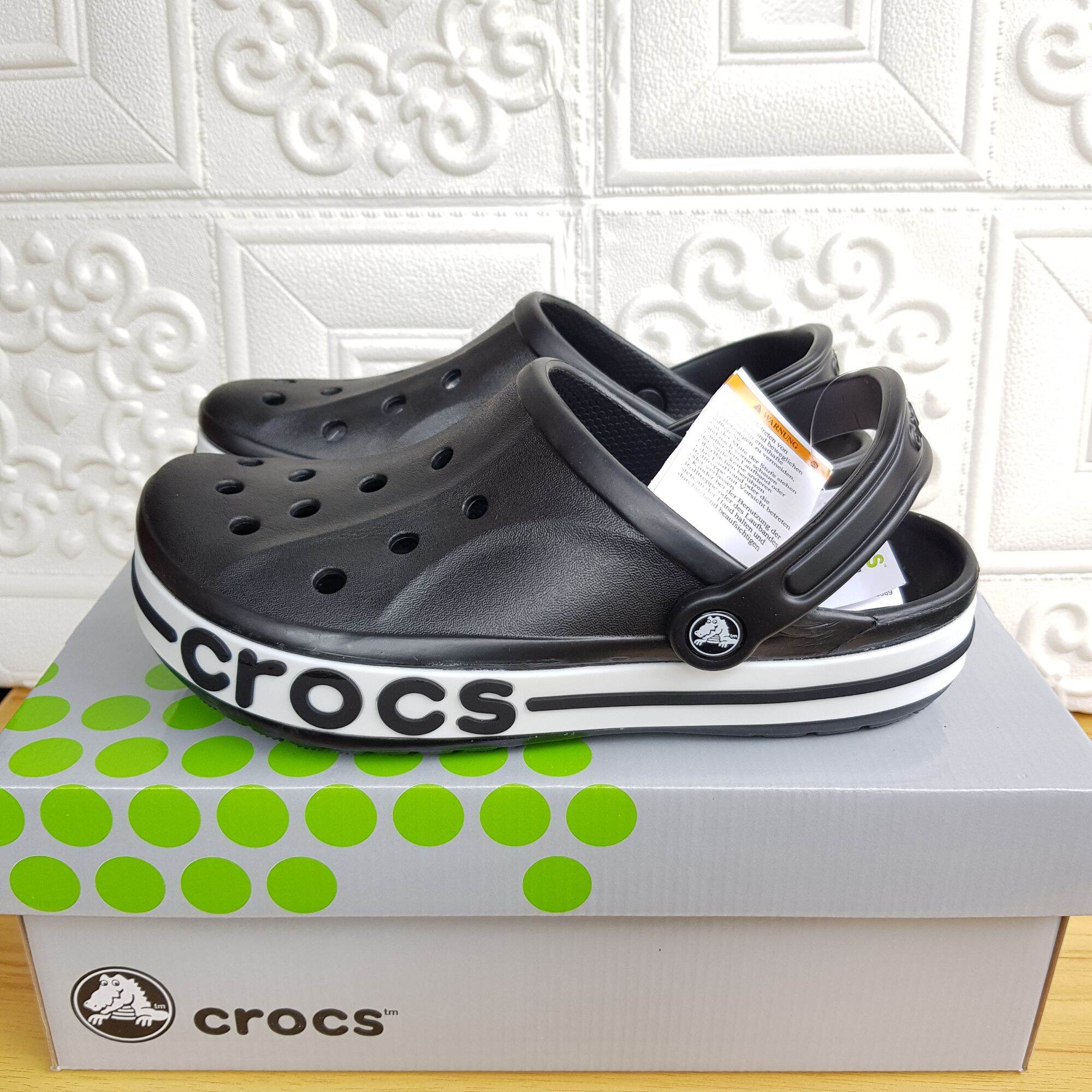 crocs with word on side