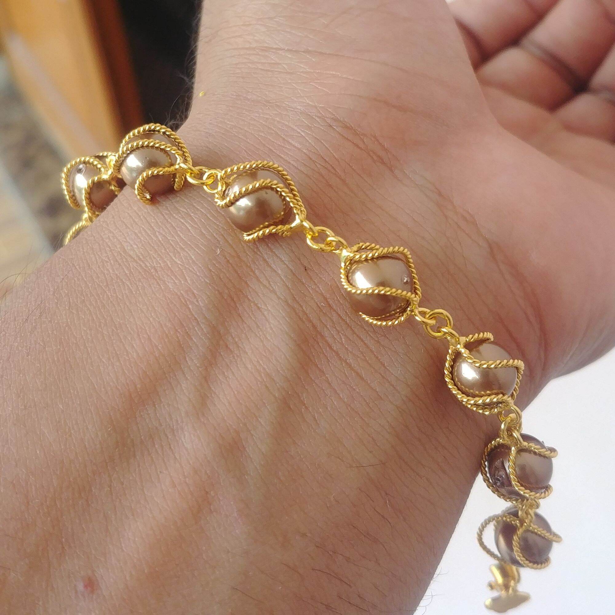 gelang mutiara cokelat Kurung Lapis 
