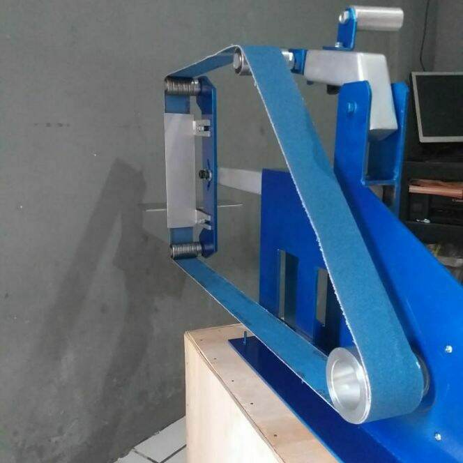 Mesin belt outlet grinder