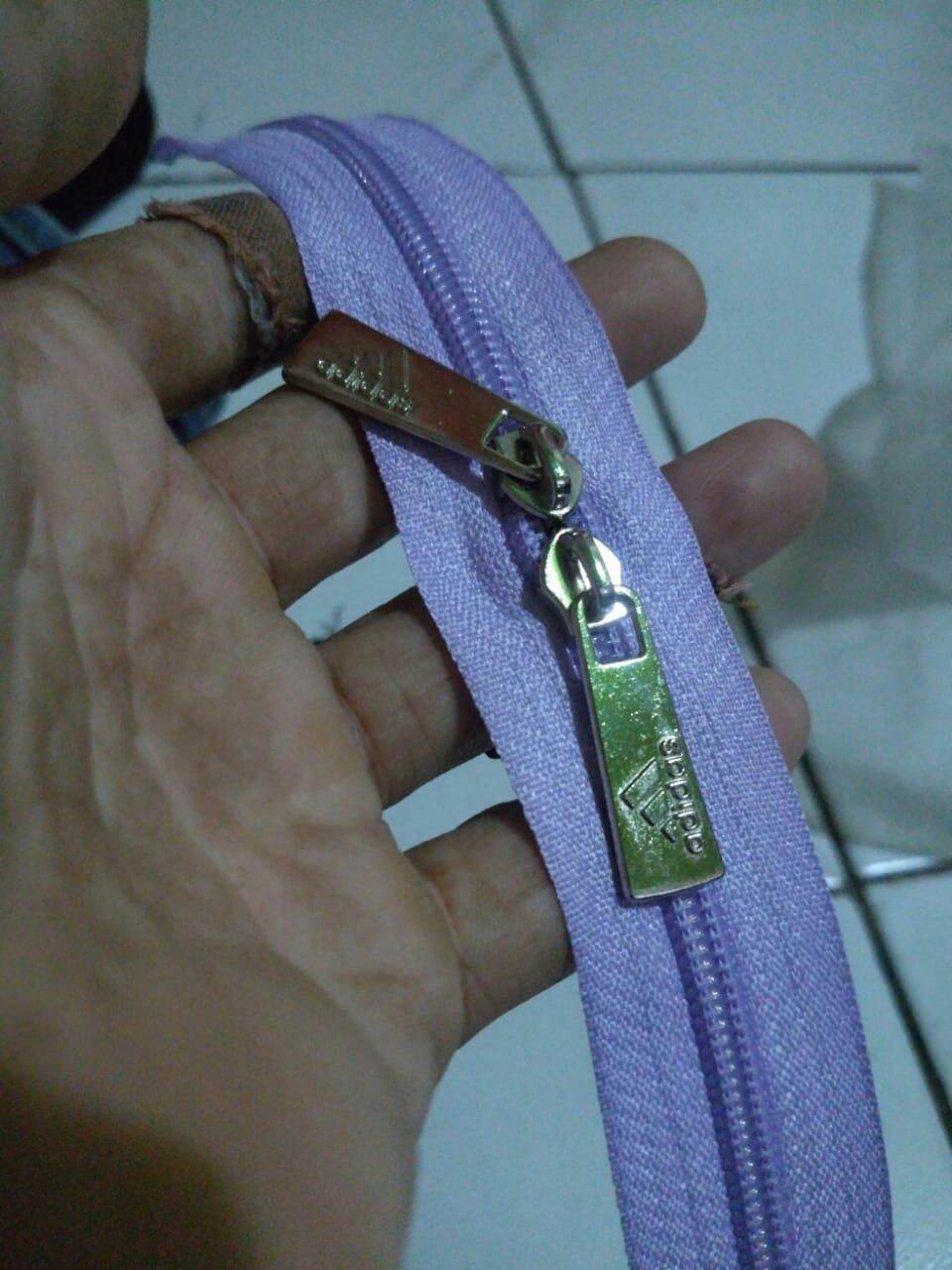 #5 PAKET RESLETING TAS NO.5 SEBANYAK 1 - 3 METER + KEPALA LOGO 2 PCS SUDAH DIPASANGKAN. UNTUK REPARASI TAS JAHIT ULANG.
